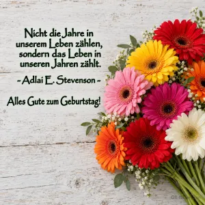 Bunter Gerbera-Strauß auf Holz, Zitat: Nicht die Jahre in unserem Leben zählen, sondern das Leben in unseren Jahren. Alles Gute zum Geburtstag!