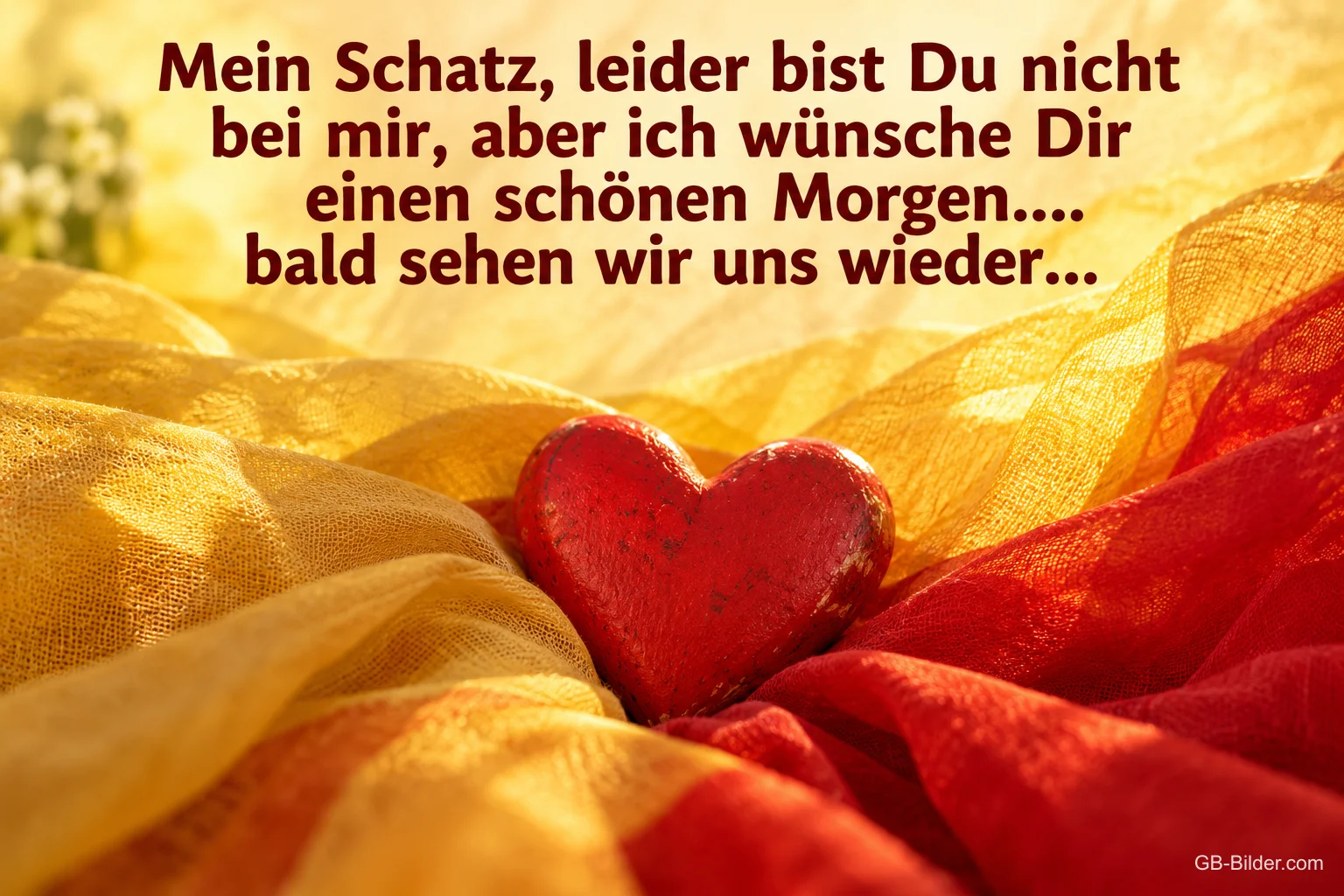 Rotes Herz auf gelben und roten Tüchern, Text: Mein Schatz, leider bist du nicht bei mir, aber ich wünsche dir einen schönen Morgen
