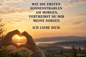 Hände formen ein Herz im Sonnenaufgang, Text: Wie die ersten Sonnenstrahlen am Morgen, Ich liebe dich.