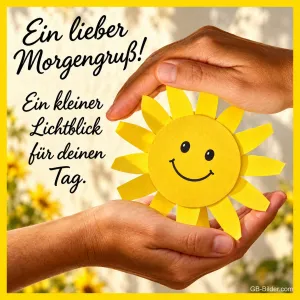 Zwei Hände halten eine lächelnde Papiersonne, Text: Ein lieber Morgengruß! Ein kleiner Lichtblick für deinen Tag.