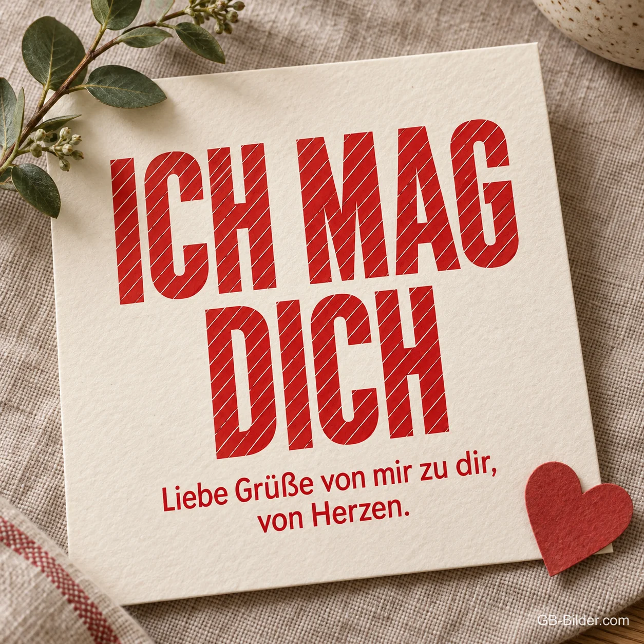 Karte mit rotem Herz auf Leinen, Text: Ich mag dich – Liebe Grüße von mir zu dir Karte mit rotem Herz auf Leinen, Text: Ich mag dich – Liebe Grüße von mir zu dir