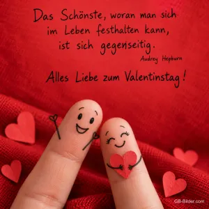 Zwei bemalte Finger umarmen ein rotes Herz, Text: Das Schönste, woran man sich im Leben festhalten kann, ist sich gegenseitig. – Audrey Hepburn – Alles Liebe zum Valentinstag!