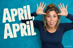 Frau streckt die Zunge heraus und wackelt mit den Händen an den Ohren, Text: April, April