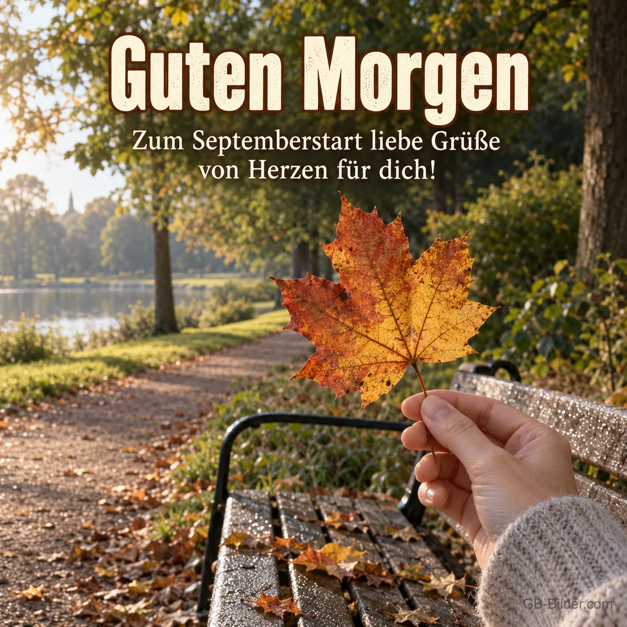 Hand mit Ahornblatt im Park, Text: Guten Morgen – Zum Septemberstart liebe Grüße Hand mit Ahornblatt im Park, Text: Guten Morgen – Zum Septemberstart liebe Grüße