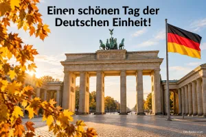 Brandenburger Tor mit Deutschlandfahne im Herbstlaub, Text: Einen schönen Tag der – Deutschen Einheit!
